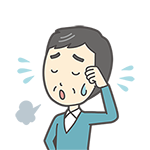 ため息をつく男性